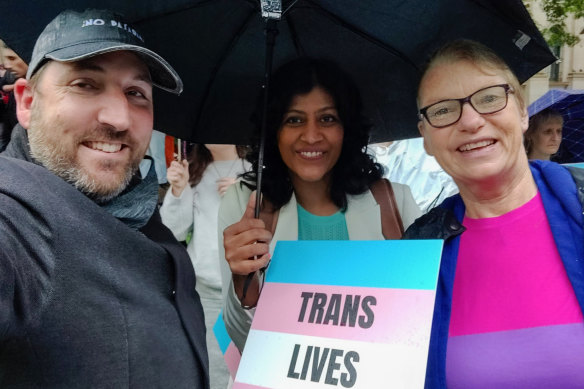 Port Phillip councillor Tim Baxter, Victorian Greens leader Samantha Ratnam and Greens Senator Janet Rice at a trans rights event.
