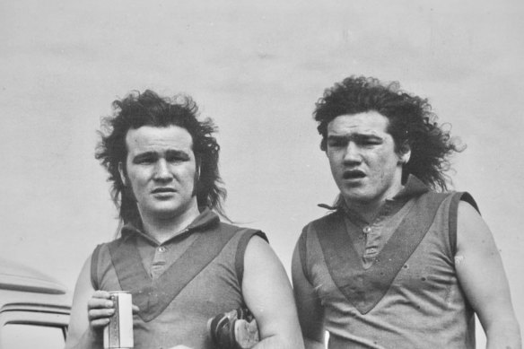 As a teenage Australian rules footballer (right) with his older brother, Brian; any natural athletic talent Birch had then was extinguished by alcohol and smoking.