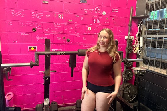 Maja Andrysiak, 20, coaches two sessions a week at the gym to empower women and increase their strength and comfort.