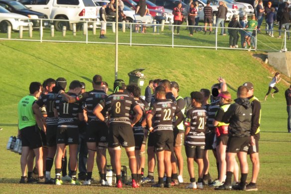 A Perth Bayswater team in a huddle in 2021. The Herald does not suggest any player pictured is involved in the judicial matter.