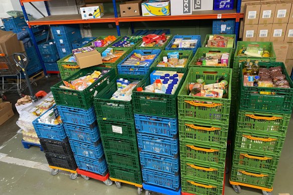 Crates at the ready: A rise in the cost of living has forced people in one of the richest countries in the world to rely on food handouts. 