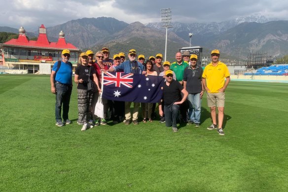 The touring group from Australia Sports Tours standing on the lush field at Dharamsala’s Himachal Pradesh Cricket Association Stadium.