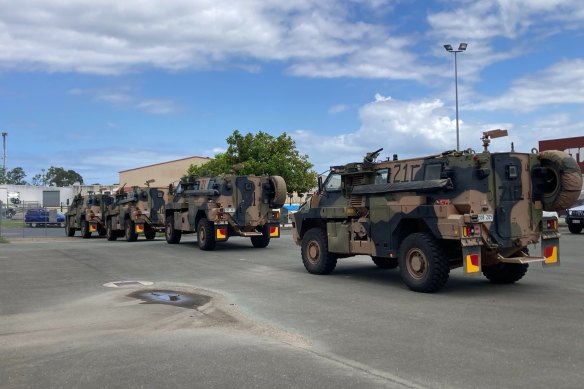 A convoy of Australian Army vehicles on its way from Caboolture to Greenbank to help in the Logan, Gold Coast and Scenic Rim areas.