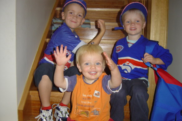 Middle child Sam with brothers Jack and Tom.