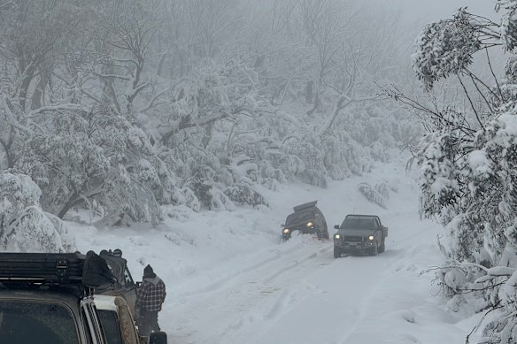 SES volunteers and police rescued 13 people stuck in their vehicles near Hotham Heights on Sunday.
