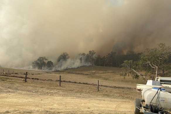 The bushfire burns on a property in Moparrabah near Kempsey.