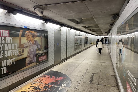 The controversial ads displayed at a Tube station in London.