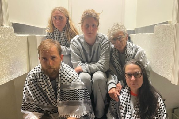 Australian Global Sumud Flotilla activists (back row from left) Isla Lamont, Neve O’Connor, Anny Mokotow and (front row) Zack Schofield and Dr Bianca Webb-Pullman in a hospital in Turkey after flying from Israel to Istanbul.