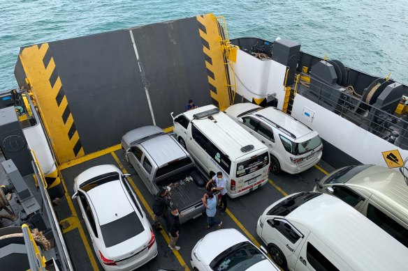 An ambulance containing Shane Warne’s body on a ferry to the mainland from Koh Samui.