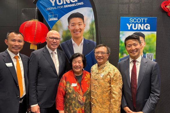 Xie Xiongming (far left) next to Opposition Leader Peter Dutton at an event promoting Liberal candidate Scott Yung (far right).