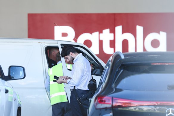 Drivers bring vehicles into Bathla’s Girraween headquarters for what appears to be an odometer reading as staff are informed of the latest developments.