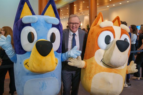 Prime Minister Anthony Albanese with characters from popular ABC children’s program Bluey.