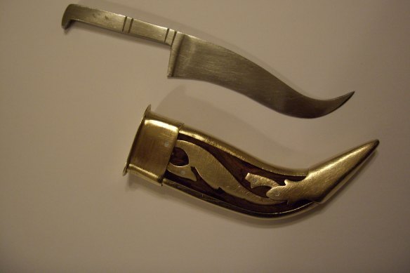 A Kirpan, or ceremonial dagger, is one of five things a baptised Sikh is required to carry on their body.