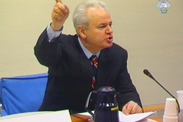 Former Yugoslav president Slobodan Milosevic appears before the UN War Crimes Tribunal in 2002.