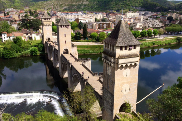 Cahors charms with its 14th century stone arched bridge, Pont Valentre.