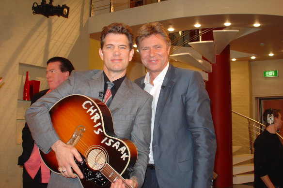 Richard Wilkins (right) with Chris Isaak.