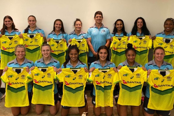 One of the girls: Tom Carter with the Australian women's sevens side. 
