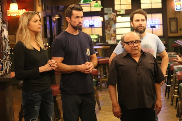 Kaitlin Olson, Rob Mac, Danny DeVito and Charlie Day in It’s Always Sunny in Philadelphia.
