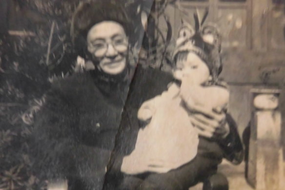 Tu with her grandfather, Xiao Gao Wu, who told her to learn a language and see the world.
