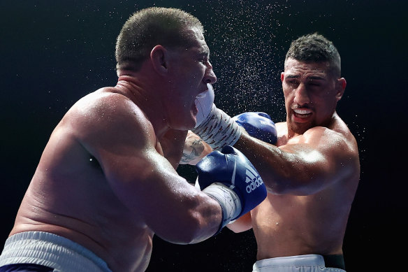 Huni gets a hit on Paul Gallen during his win over the former league star earlier this month.
