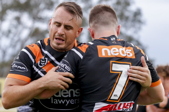 Josh Reynolds (left) warms up for the match against the Panthers on Saturday night.