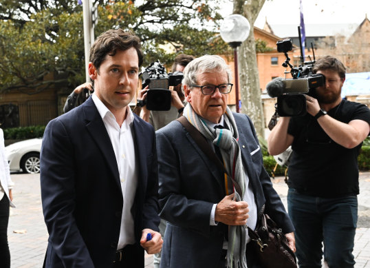 Nick McKenzie and Chris Masters arrive at the Law Courts building in Sydney.