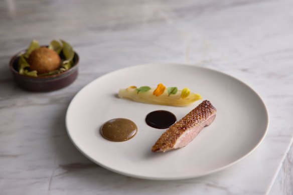 Dry aged Wagin duck, confit duck leg, burnt pineapple, endive, sunrise lime, duck bone sauce.