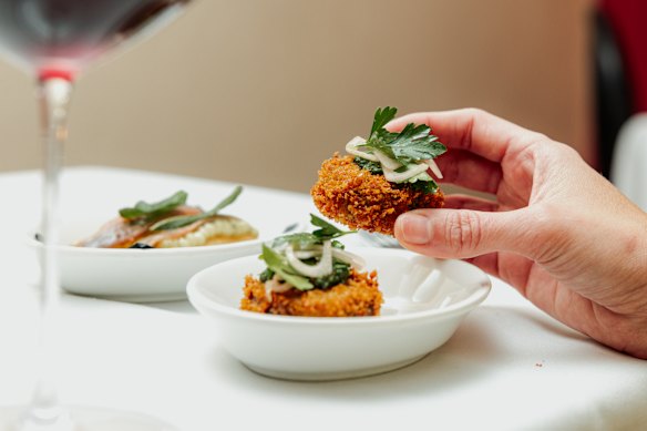 Pig’s head croquettes with salsa verde.