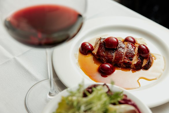 Pan-seared duck breast with pickled cherries.