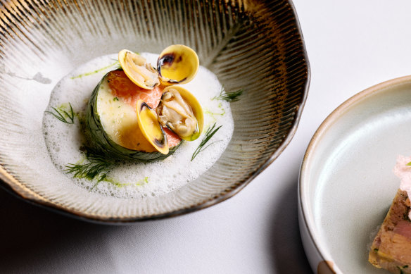 Confit ocean trout with scallop mousse, sauteed spinach and a champagne veloute.
