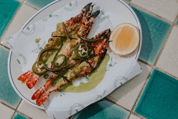 BBQ tiger prawns with parsley, native herbs and lemon on Le Club Lacoste’s menu.