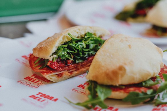 A house-baked puccia with hot salami, provolone, semi-dried tomatoes, rocket and chilli at Tooradeli.