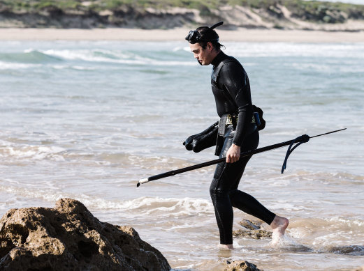 Tobin Kent catching leatherjacket at Point Impossible, near his Moonah restaurant. His catches are for personal use, as it’s illegal for a restaurant to serve recreationally caught seafood.