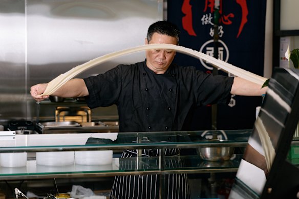 Kieran Zou at work in the kitchen.