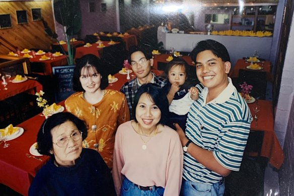 A tiny Nat and her family at their restaurant, Thai Hut.
