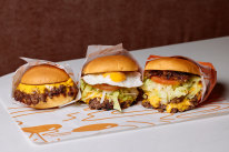 Two Yolks’ burgers feature imported American buns, Cape Grim grass-fed beef and Bangalow pork.
