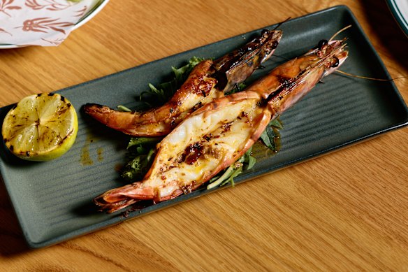 Chargrilled Mooloolaba prawns with herbs and garlic butter.
