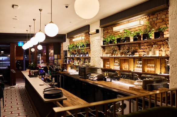 Doughcraft’s bar is serving a cocktail menu that twists the classics and a 40-bottle wine list.