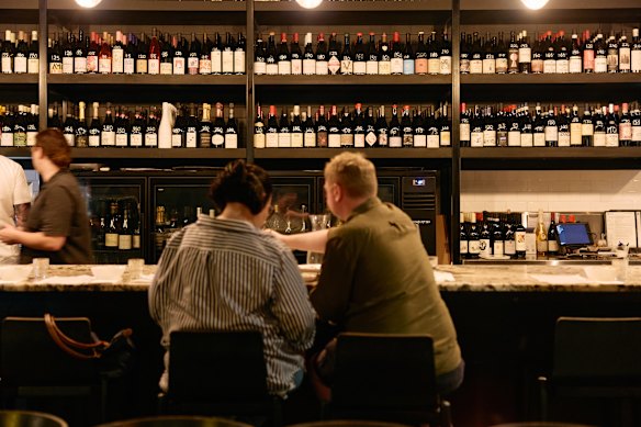 Wine shares equal billing with the food at Snack Man.