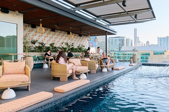 The hotel has transformed its pool terrace, removing a sauna and a gym to create an intimate 60-seat bar.