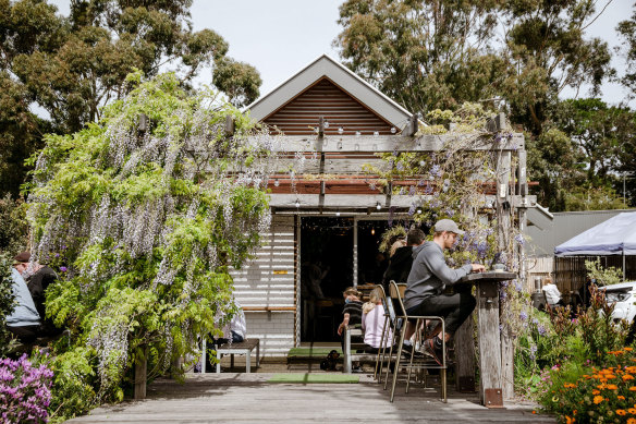 Ginger Monkey’s shaded deck is popular with locals.