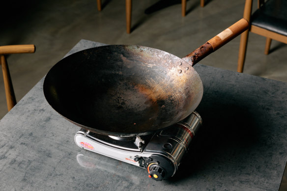 If you don’t have a dedicated wok burner in your kitchen, Yeoh recommends a camp-style burner. 