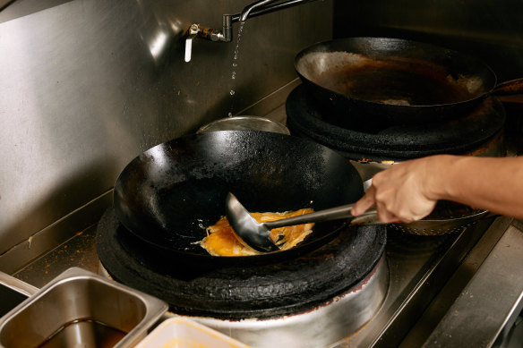 Yeoh says it’s important to season your wok before putting it to work.