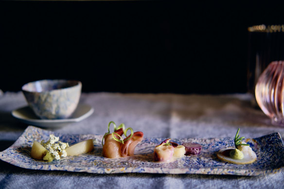 Cold plate entree (from left): Baby turnip with sakekasu powder; Hiramasa kingfish zuke, wasabi oil, spring onion; Murasaki daikon pickled in white miso; Shark Bay blue swimmer crab Puree with French breakfast radish, avocado and local seaweed.
