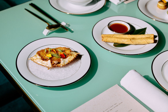 Baked Queensland blue swimmer crab in its shell with calamansi, and pork spring rolls.
