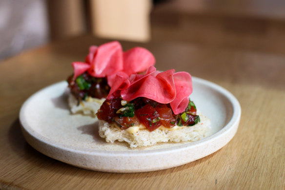 Yellowfin tuna with fried rice noodle and watermelon radish.