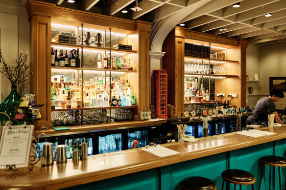 The old Little Big House has been given a very British vibe to become The Rose &amp; Crown, with a white-and-teal paint job, walls decorated with plates and old-school paintings.