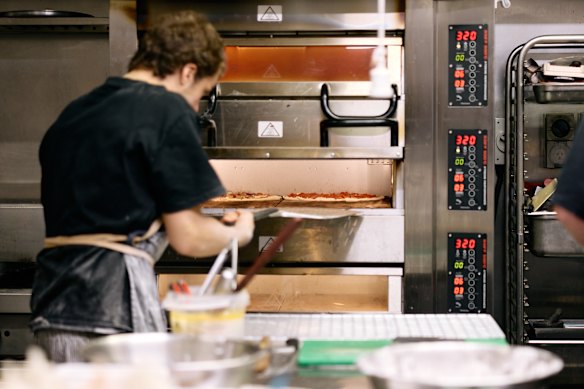 In the kitchen is a PizzaMaster oven, used by many top pizza restaurants in the United States.