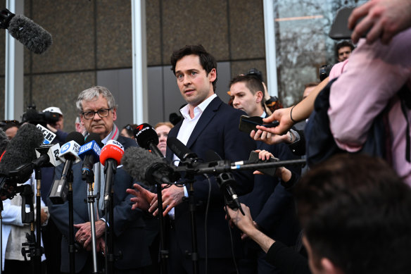 Nick McKenzie, with colleague Chris Masters (left) speaks to the media after the Ben Roberts-Smith defamation case.