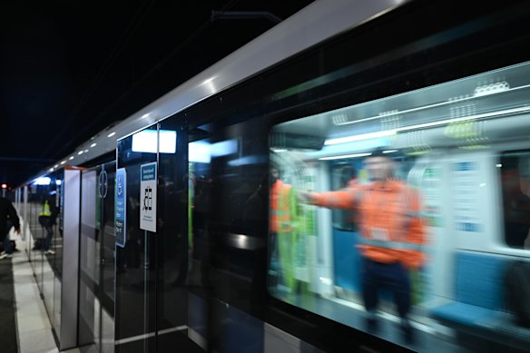 The first Metro train arrives at Sydenham station.